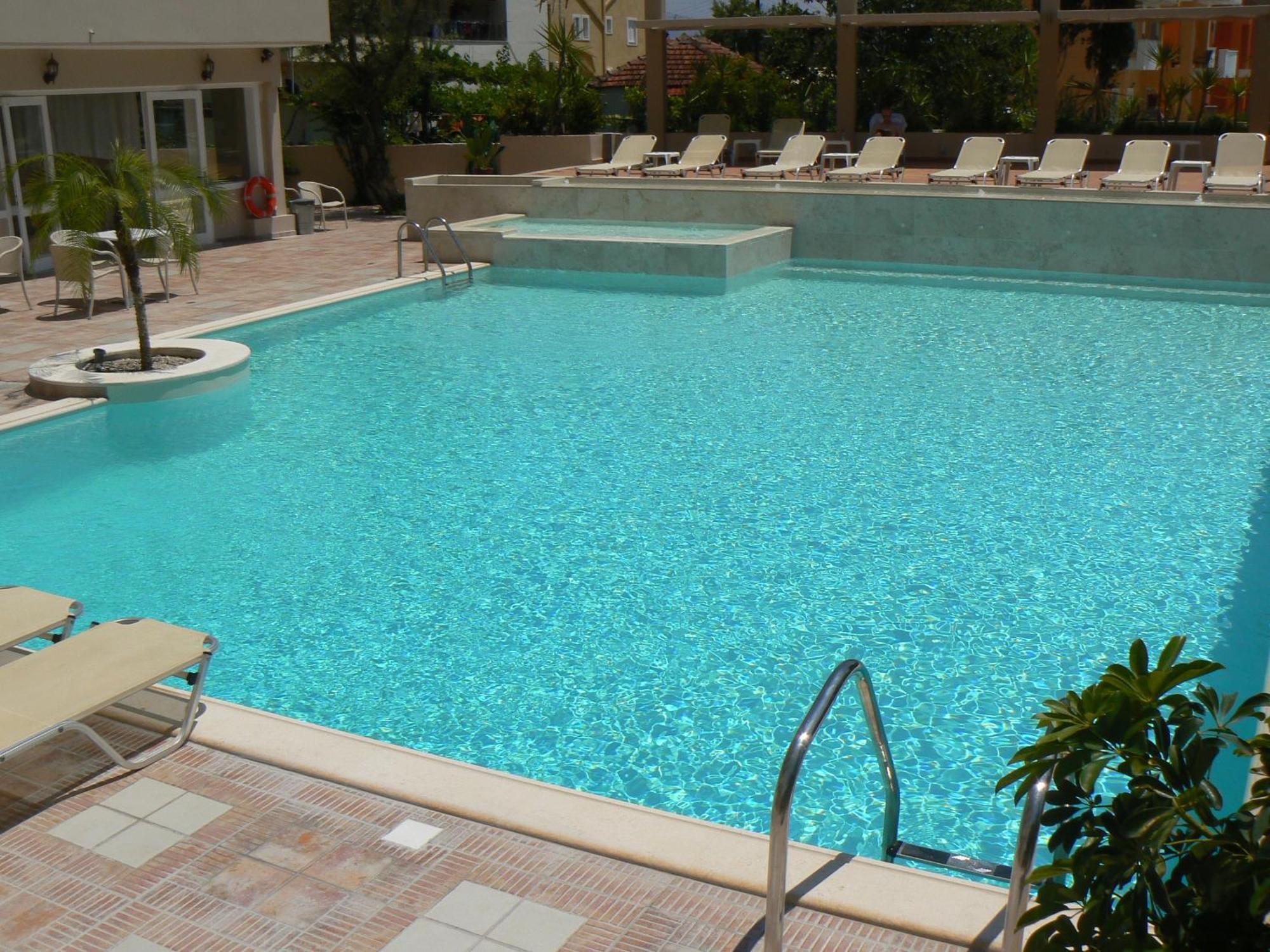 Happyland Hotel Apartments Нідрі Екстер'єр фото