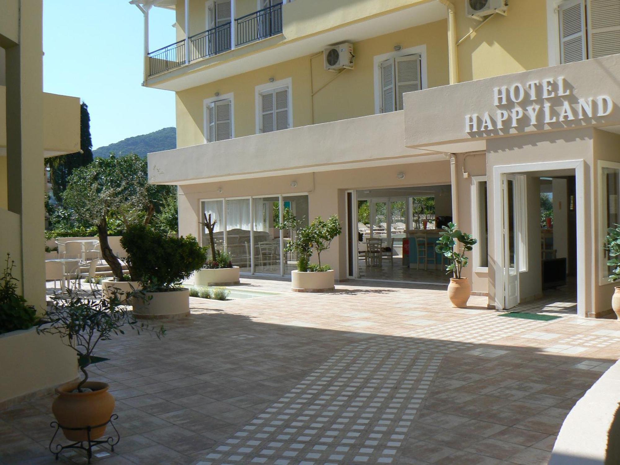 Happyland Hotel Apartments Нідрі Екстер'єр фото