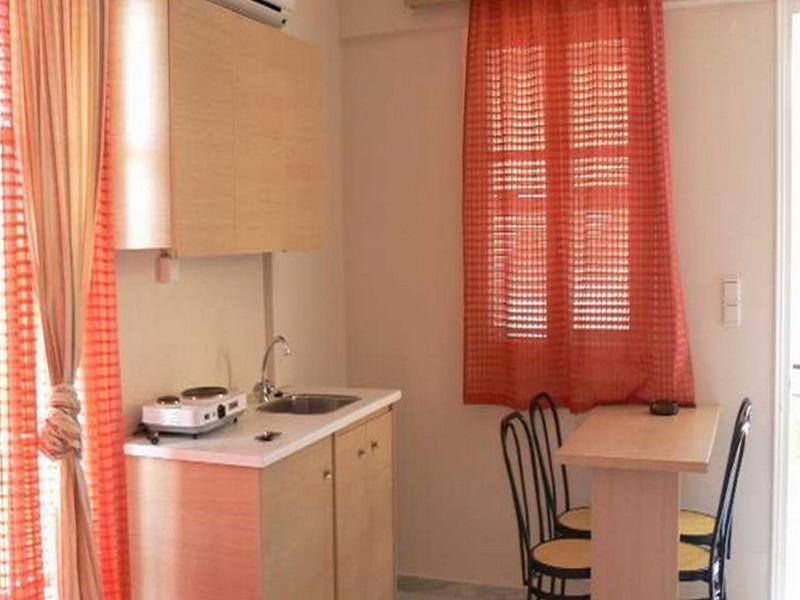 Happyland Hotel Apartments Нідрі Екстер'єр фото