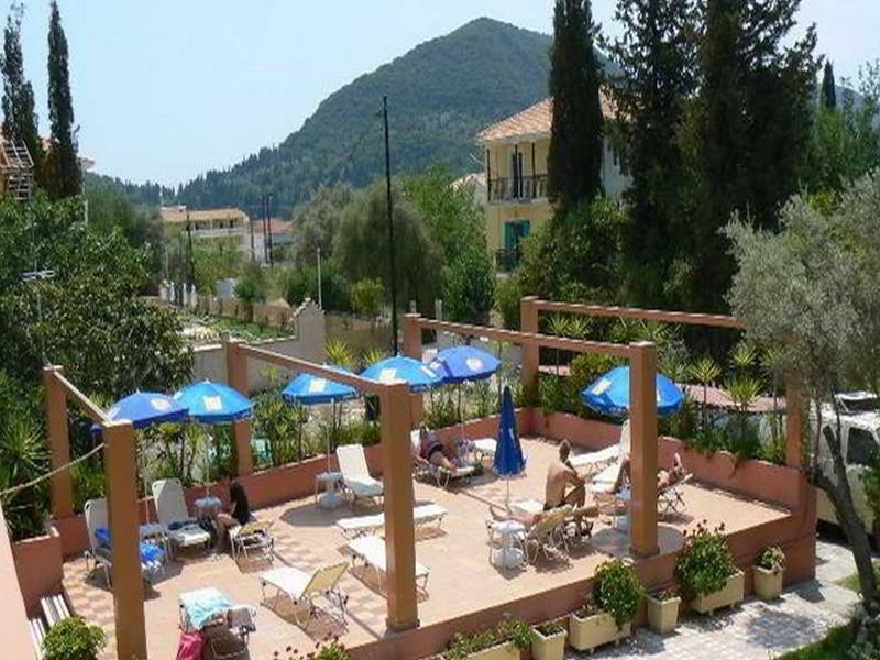 Happyland Hotel Apartments Нідрі Екстер'єр фото