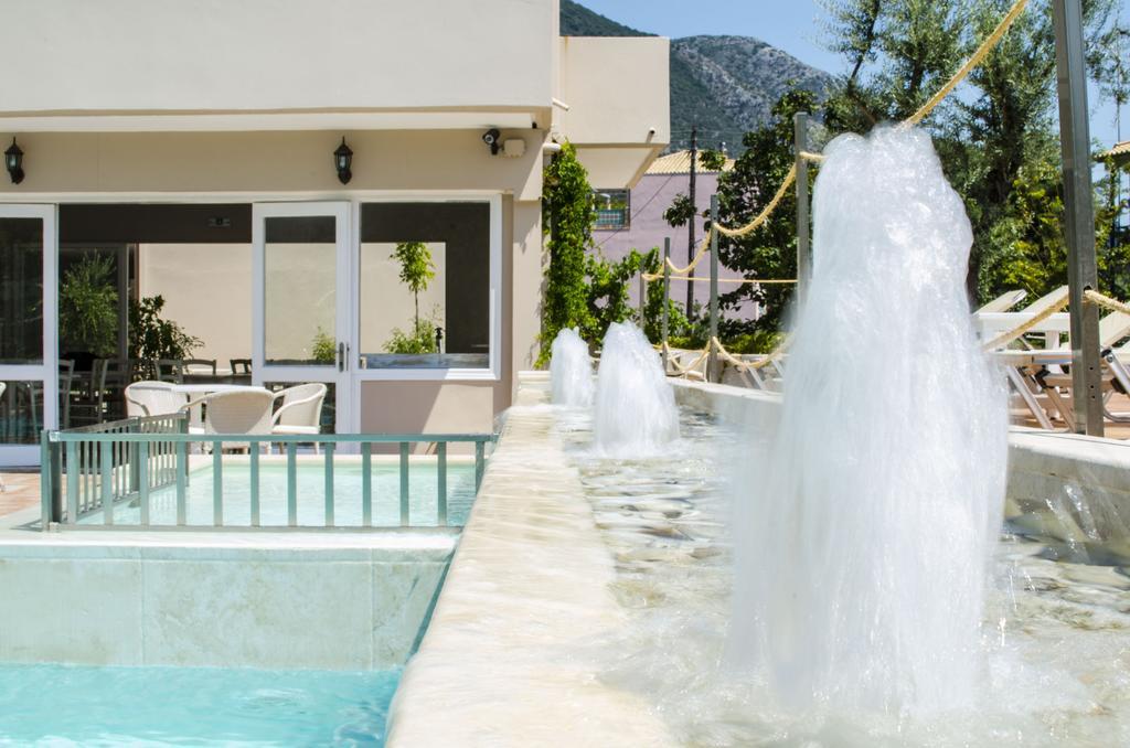 Happyland Hotel Apartments Нідрі Екстер'єр фото