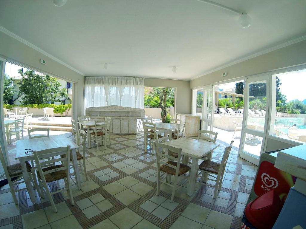Happyland Hotel Apartments Нідрі Екстер'єр фото