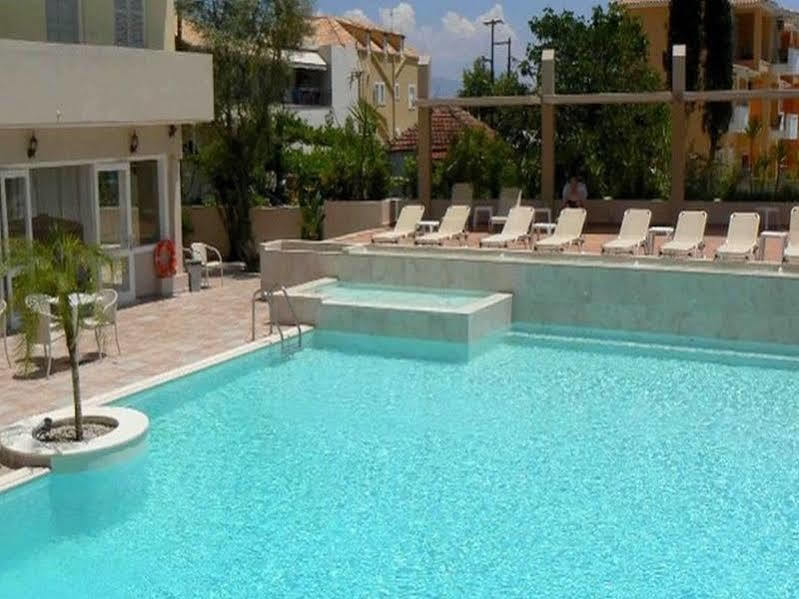 Happyland Hotel Apartments Нідрі Екстер'єр фото