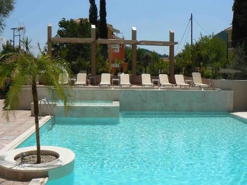 Happyland Hotel Apartments Нідрі Екстер'єр фото