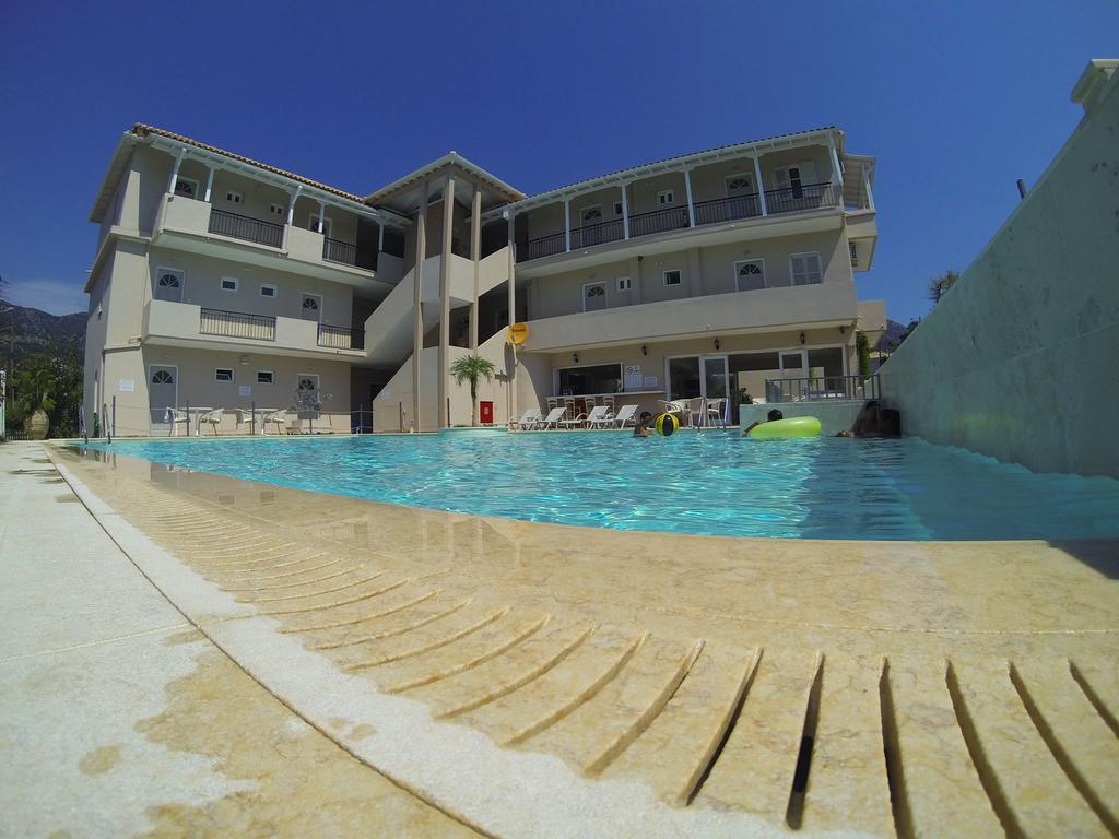 Happyland Hotel Apartments Нідрі Екстер'єр фото